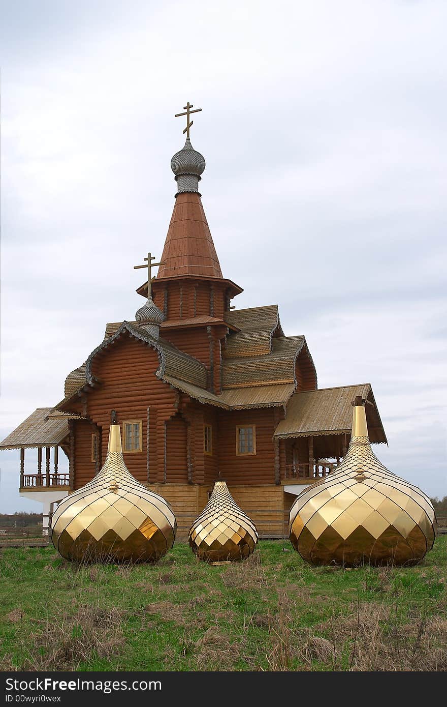 Three golden dome on the ground with green grass. Three golden dome on the ground with green grass