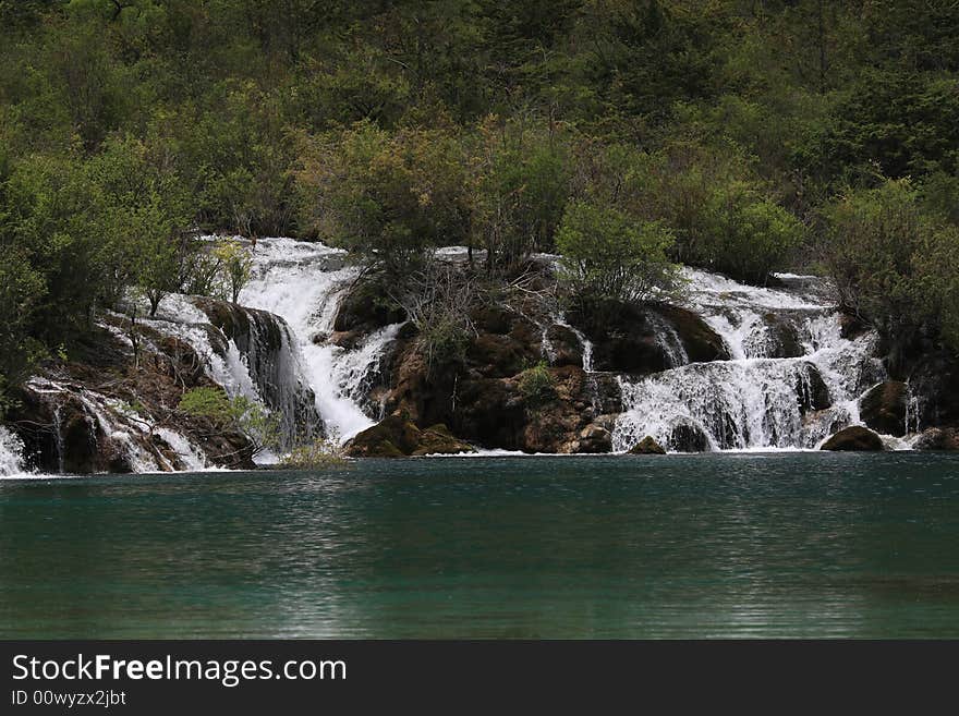 Waterfall and  lake