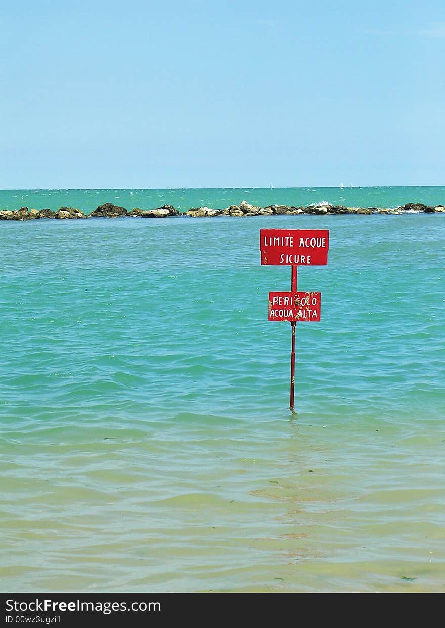 An italian signal indicating the limit for safe swimming. An italian signal indicating the limit for safe swimming