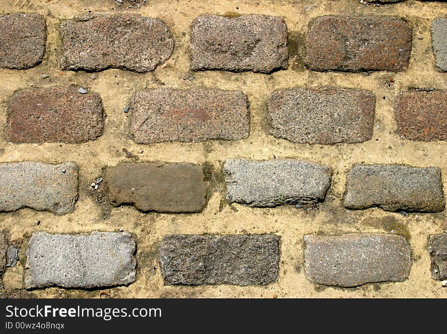 Close up abstract photo of cobbles in a street in Eton, England