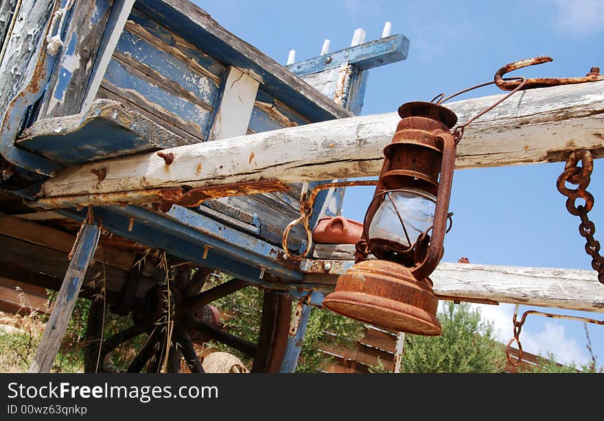 Old wooden carriage reminding far west times. Old wooden carriage reminding far west times