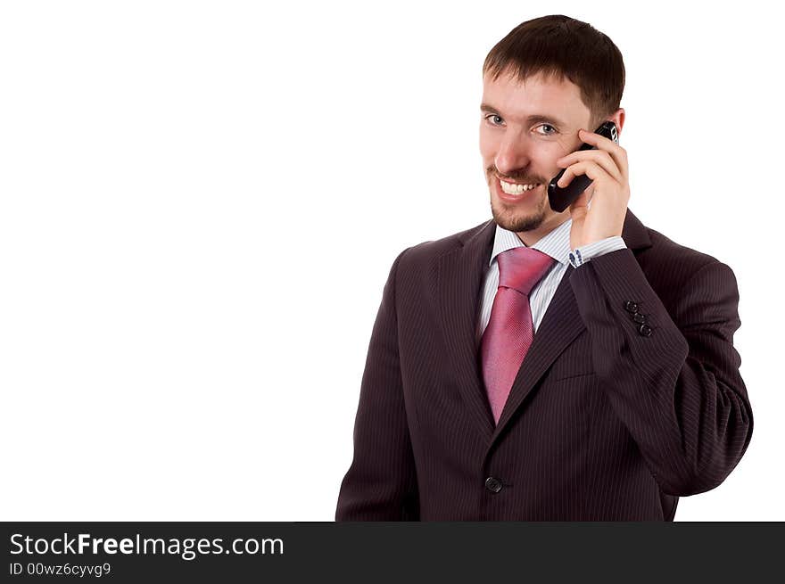 Young modern business man talking on cell phone (isolated on white)