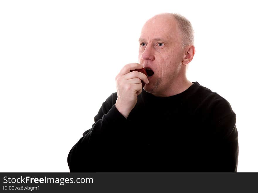 Man in Black Eating a Red Apple