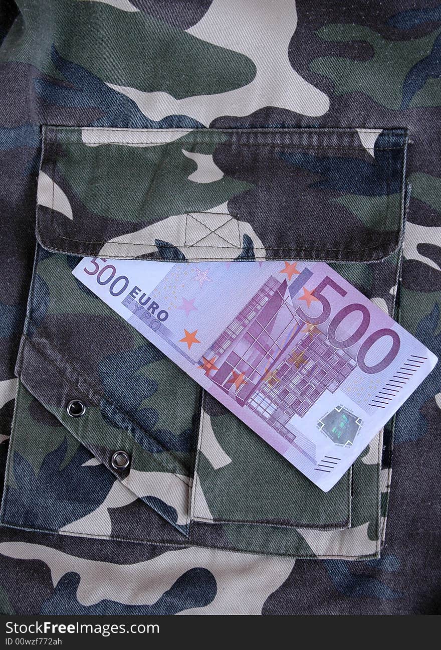 Euro in the pocket of a casual garment.  Photographed in a studio.