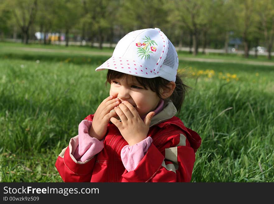 Little girl happy smilling in spring park