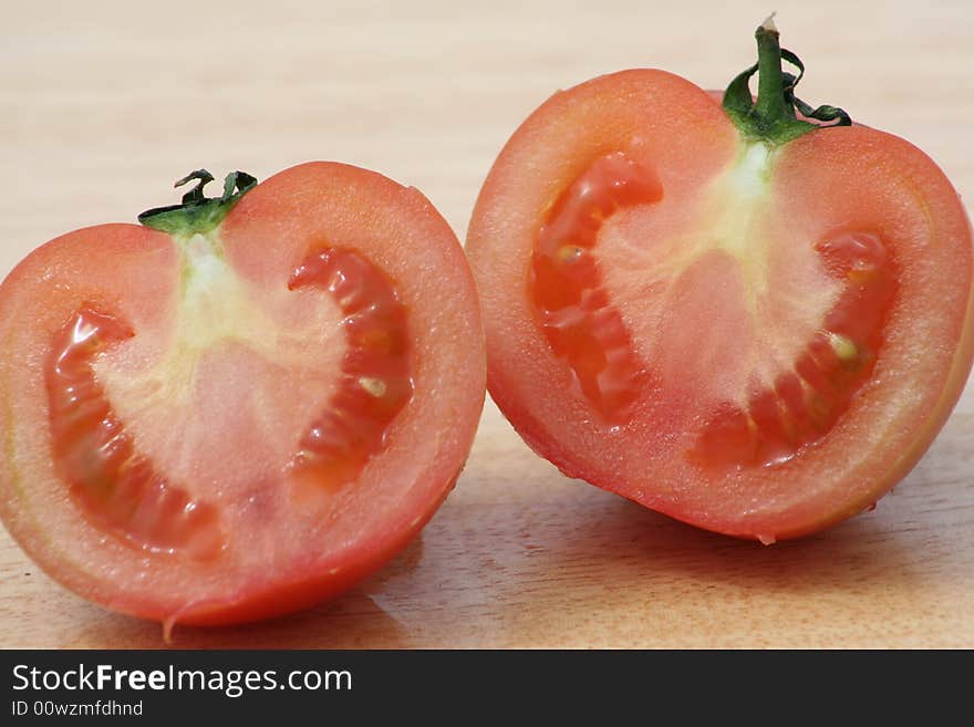 Fresh tomato in half for salad. Fresh tomato in half for salad