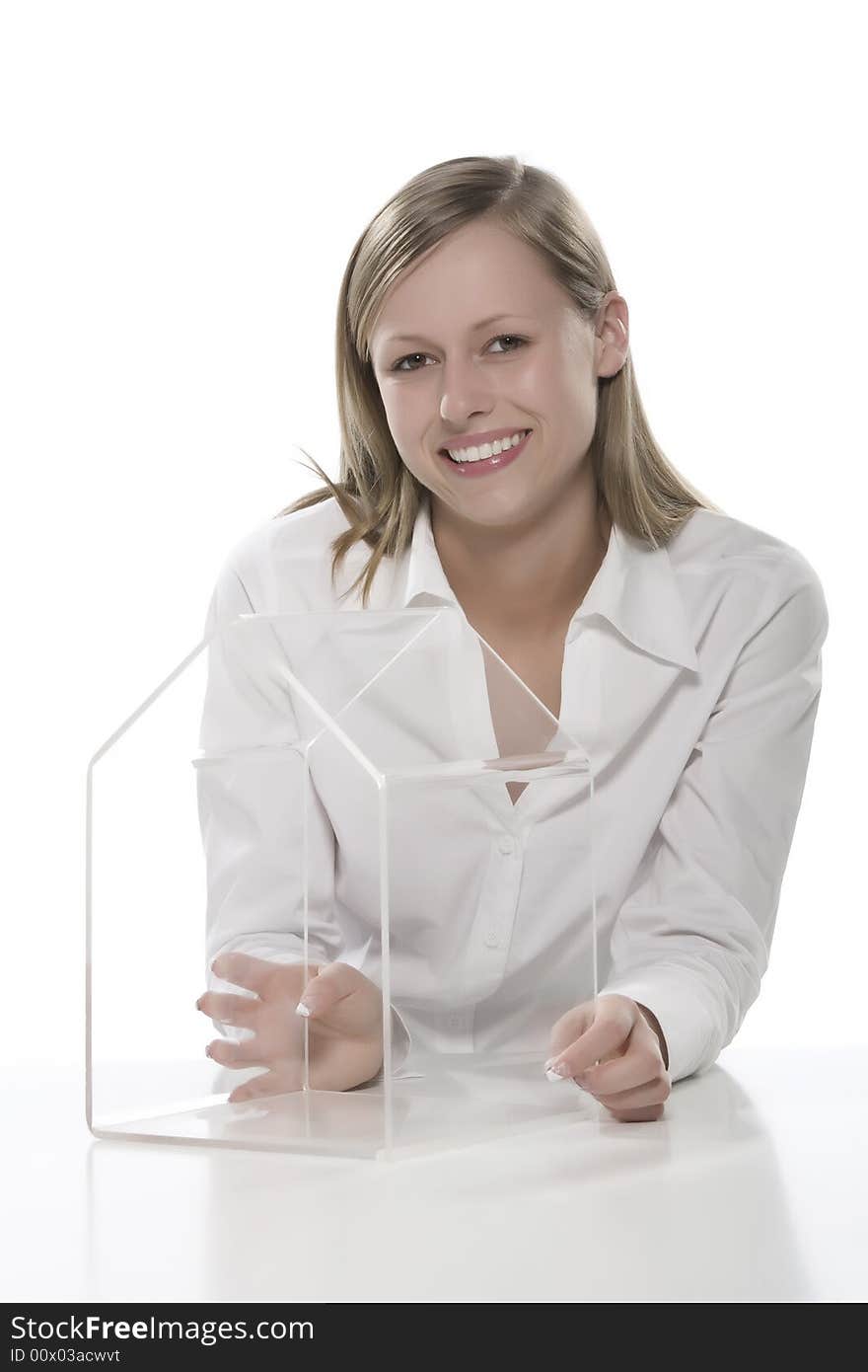 Young women with small house transparent hand