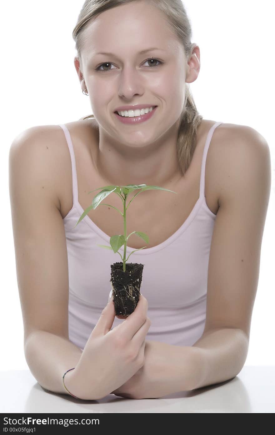 Isolated on white backgorund woman with plant. Isolated on white backgorund woman with plant