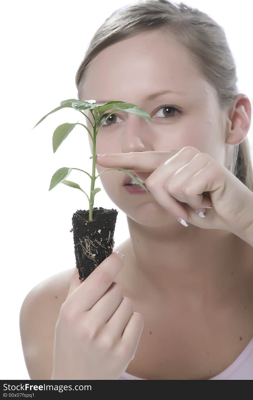 Isolated on white backgorund woman with plant. Isolated on white backgorund woman with plant