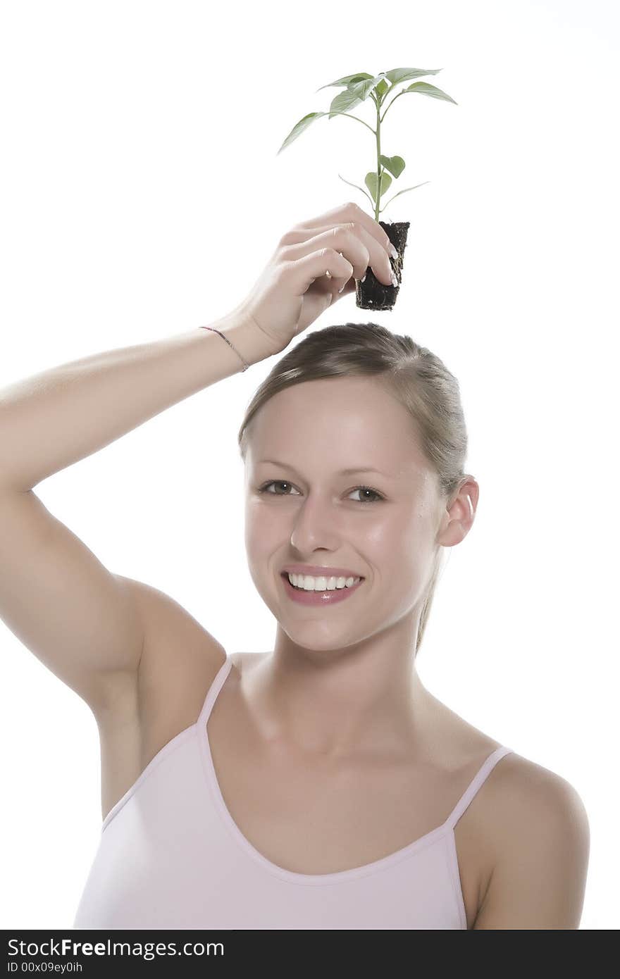 Isolated on white backgorund woman with plant. Isolated on white backgorund woman with plant