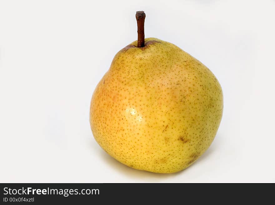 Mature juicy green pear on a white background.