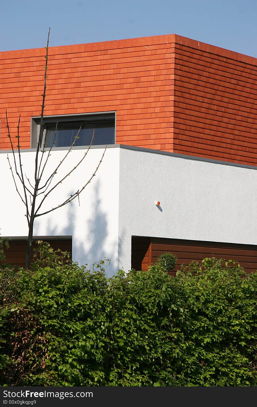 Detail of a modern villa, picture of the wall and the roof. Detail of a modern villa, picture of the wall and the roof