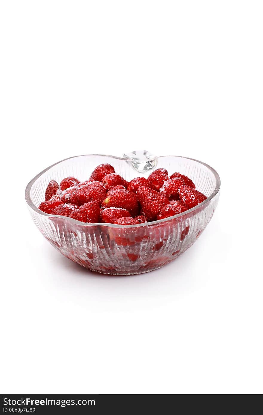 Fresh strawberries with sugar on top isolated on white background