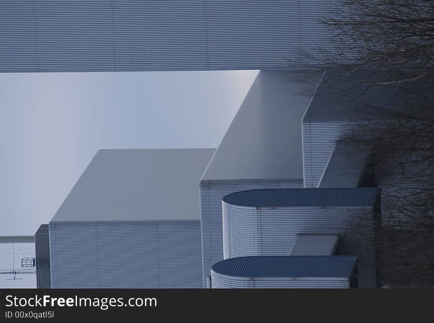 A view at an industrial area against the sunlight. A view at an industrial area against the sunlight.