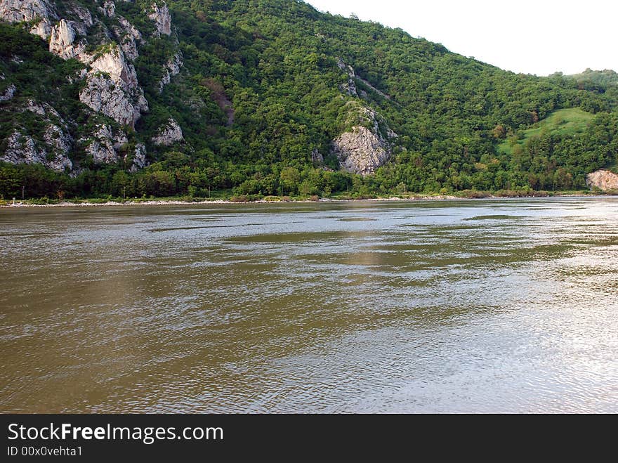 River Danube rural landscape and green hill. River Danube rural landscape and green hill