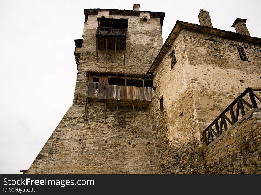 Low angle photo of the Ouranoupolis tower that is located right next to the dock