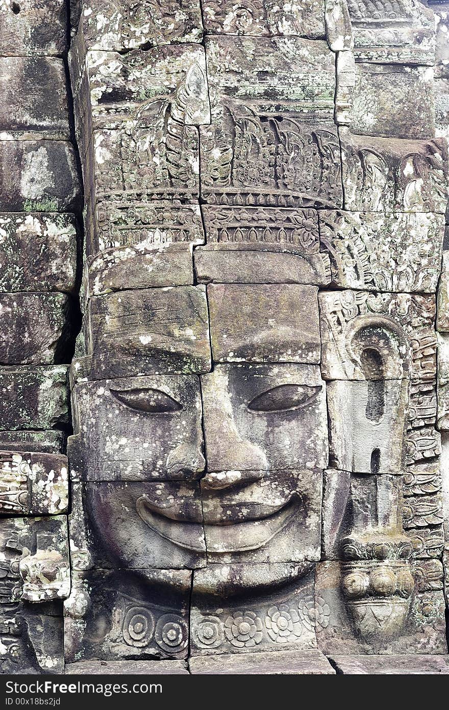 The bayon construction started probably arround 1200 AD during the reign of Jayavarman VII to Jayavarman VIII. Art historians considered that this temple is one of the most enigmatic religious construction in the world. Here view of one face tower in SE part of the upper terrace. The bayon construction started probably arround 1200 AD during the reign of Jayavarman VII to Jayavarman VIII. Art historians considered that this temple is one of the most enigmatic religious construction in the world. Here view of one face tower in SE part of the upper terrace