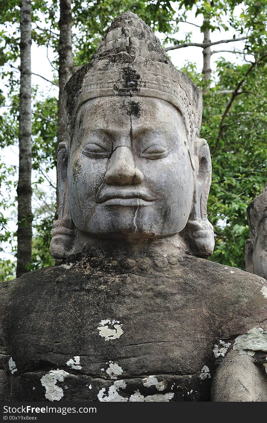 The bayon construction started probably arround 1200 AD during the reign of Jayavarman VII to Jayavarman VIII. Art historians considered that this temple is one of the most enigmatic religious construction in the world. here the naga  bridge of the main entrance with sculpted figures; here a representation of the guardians of the temple. The bayon construction started probably arround 1200 AD during the reign of Jayavarman VII to Jayavarman VIII. Art historians considered that this temple is one of the most enigmatic religious construction in the world. here the naga  bridge of the main entrance with sculpted figures; here a representation of the guardians of the temple