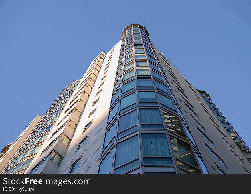 Modern building against blue sky background