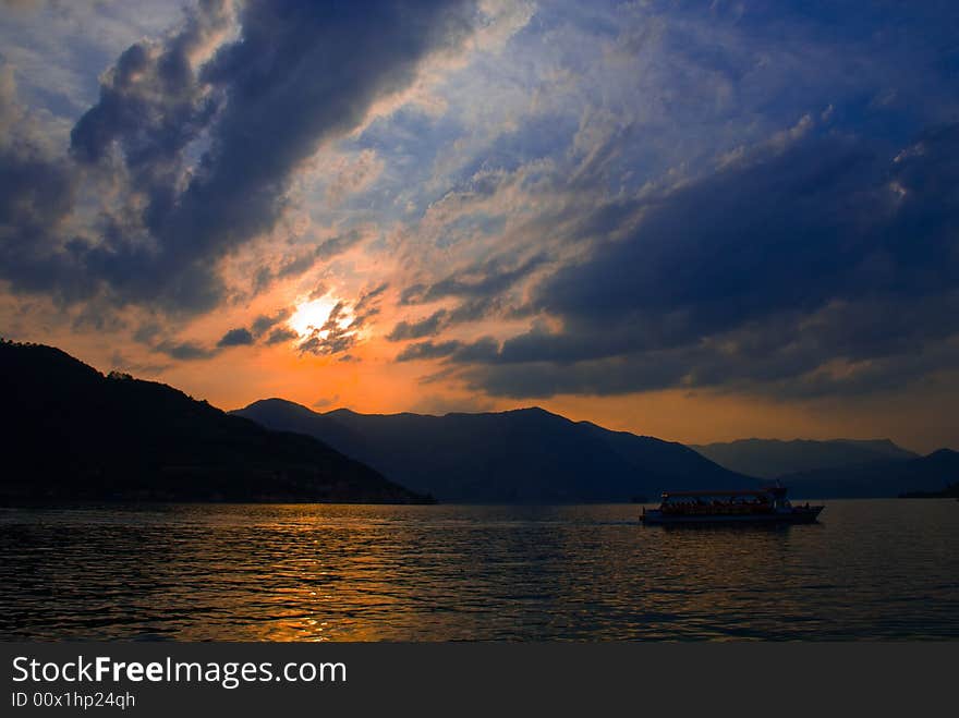 A picturesque view of the Iseo lake in Italy at sunset.