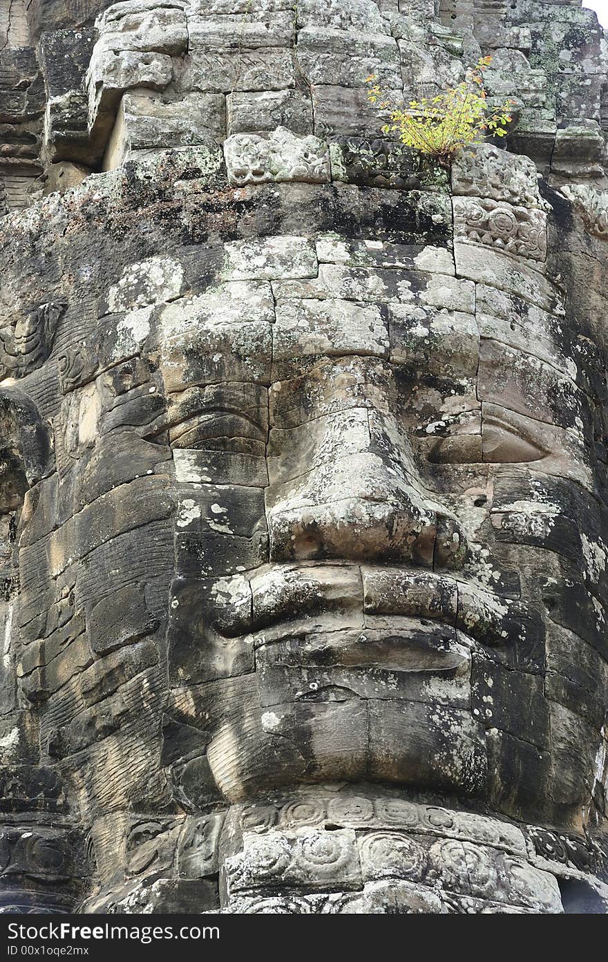 The bayon construction started probably arround 1200 AD during the reign of Jayavarman VII to Jayavarman VIII. Art historians considered that this temple is one of the most enigmatic religious construction in the world. Here view of one face tower in SE part of the upper terrace. The bayon construction started probably arround 1200 AD during the reign of Jayavarman VII to Jayavarman VIII. Art historians considered that this temple is one of the most enigmatic religious construction in the world. Here view of one face tower in SE part of the upper terrace