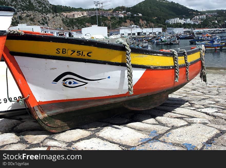 Colored boat, at the dock, in a sunny day