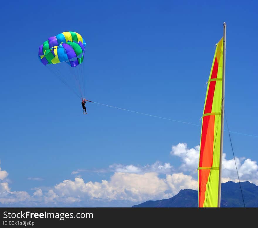 Sailing & para-sailing - beach funs. Summer colors