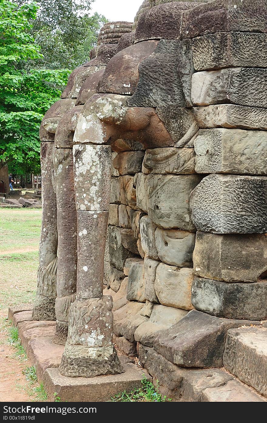 The elephant terrace in the style of bayon date from the 12th century with additions in  late 13th century during the reigns of Jayavarman VII and Jayavarman VIII ; this terrace looking out to the royal square is supported by  the 300 meters of walls of  foundation; these walls  are carved with elephants, garudas and lion headed figures. The elephant terrace in the style of bayon date from the 12th century with additions in  late 13th century during the reigns of Jayavarman VII and Jayavarman VIII ; this terrace looking out to the royal square is supported by  the 300 meters of walls of  foundation; these walls  are carved with elephants, garudas and lion headed figures