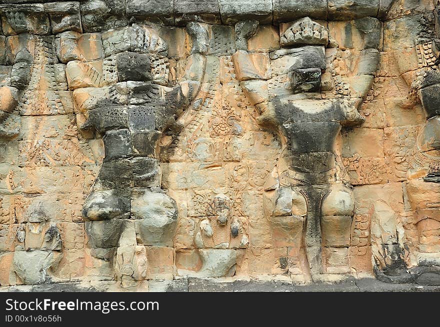 The elephant terrace in the style of bayon date from the 12th century with additions in  late 13th century during the reigns of Jayavarman VII and Jayavarman VIII ; this terrace looking out to the royal square is supported by  300 meters of walls of  foundation; these walls  are carved with elephants, garudas and lion headed figures. The elephant terrace in the style of bayon date from the 12th century with additions in  late 13th century during the reigns of Jayavarman VII and Jayavarman VIII ; this terrace looking out to the royal square is supported by  300 meters of walls of  foundation; these walls  are carved with elephants, garudas and lion headed figures