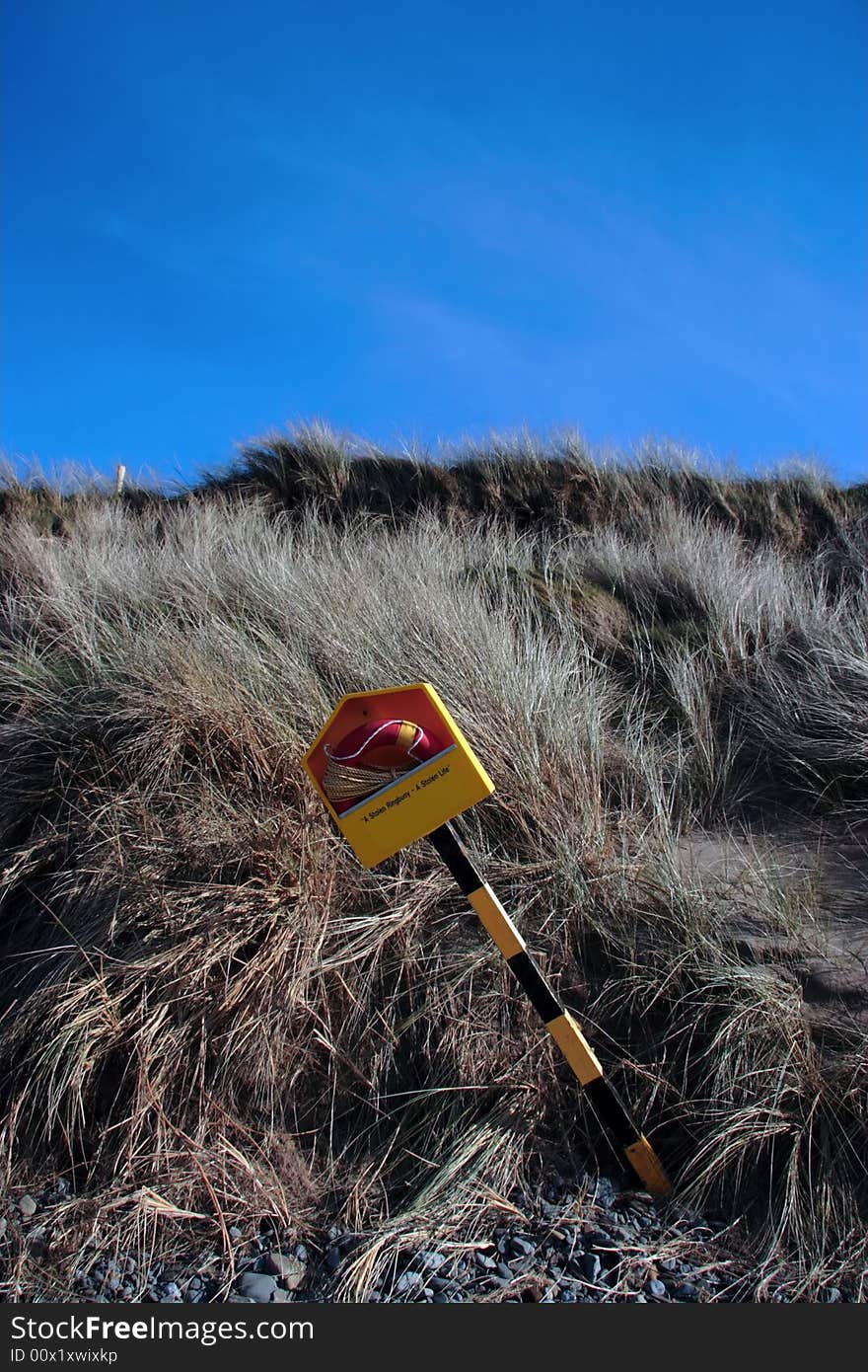 A lifebuoy on the beach in beale county kerry ireland. A lifebuoy on the beach in beale county kerry ireland