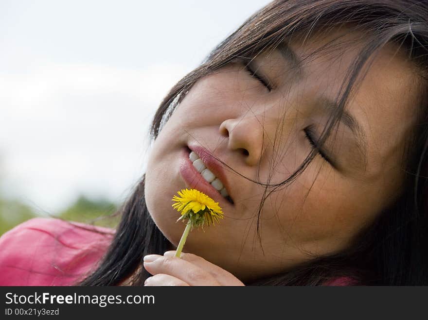 Woman with dandelion