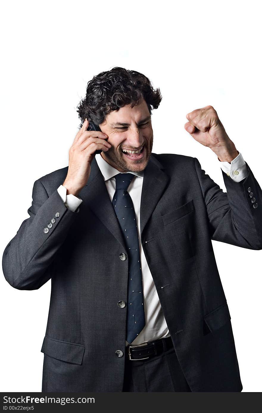 Expression of a successful businessman talking on a mobile phone