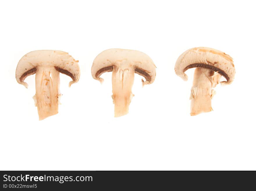 Sections of a mushroom isolated on a white background. Sections of a mushroom isolated on a white background