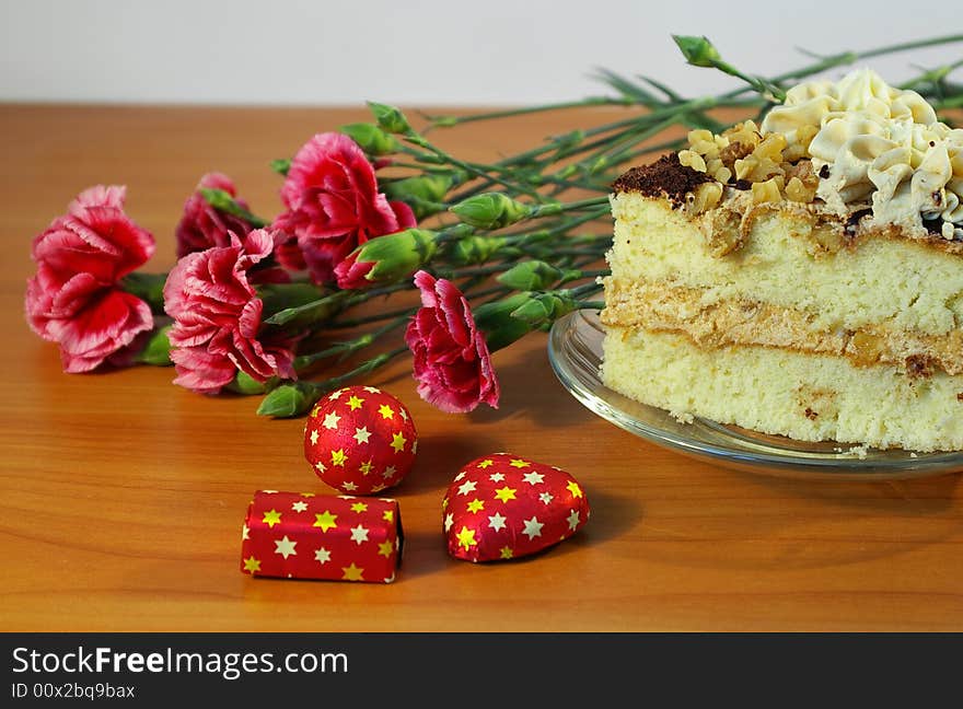 Bouquet of flowers and cake