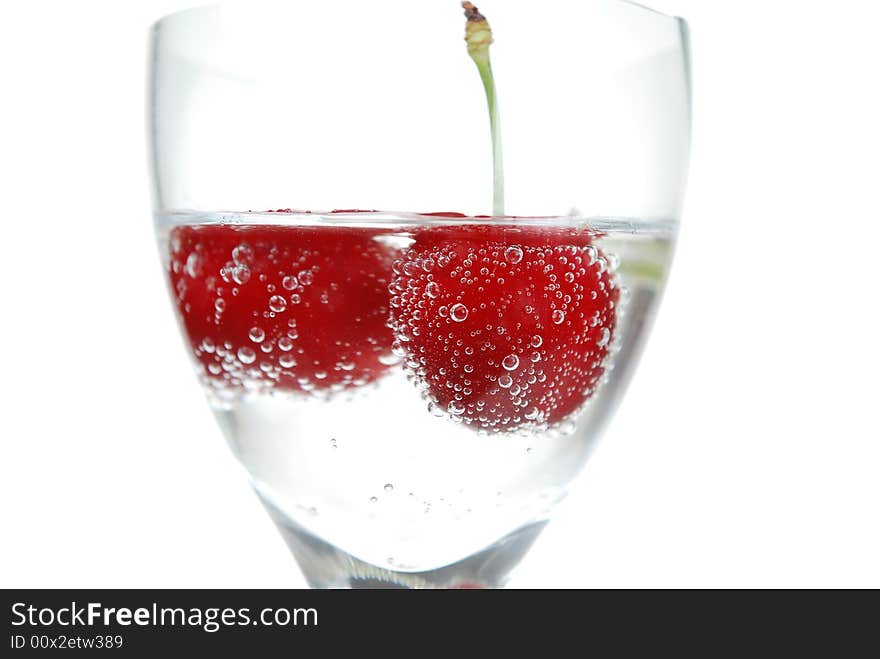 Sour Cherry  with bubbles in glass filed with tonic soda