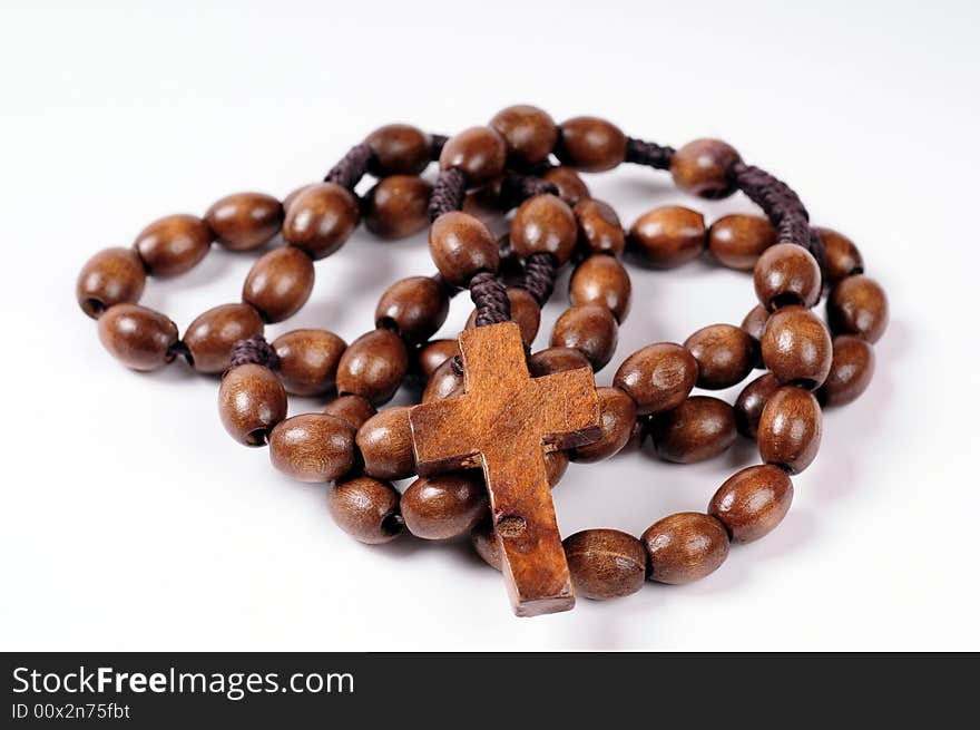 A rosary on white background