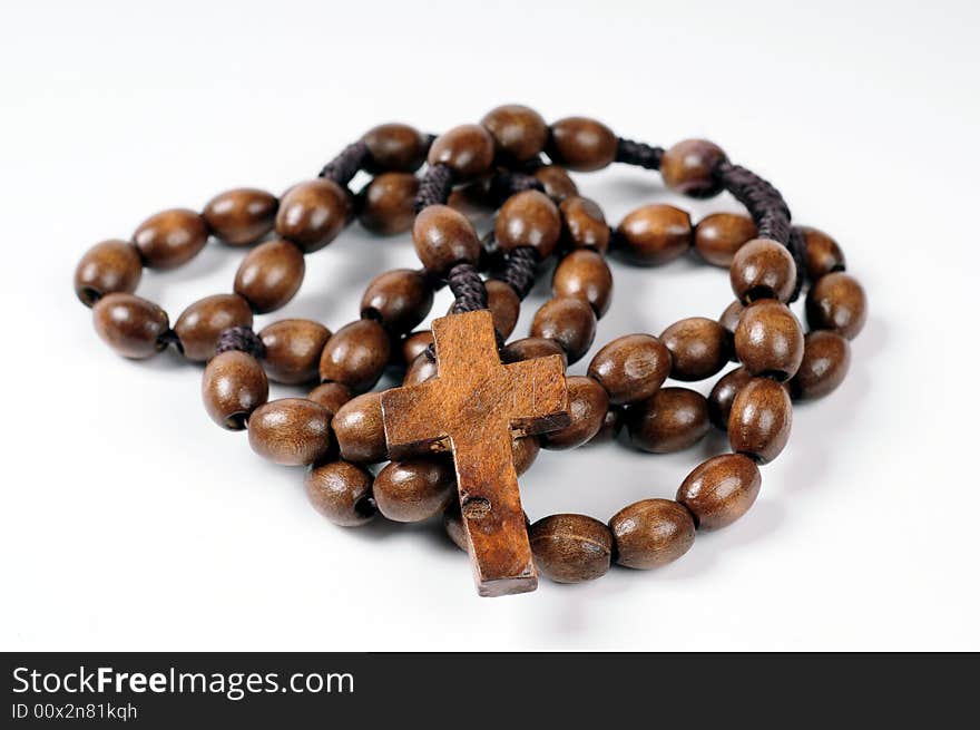 A rosary on white background