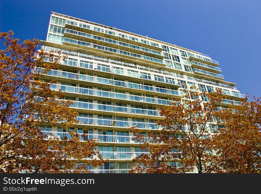 Urban Condominium with balconies used as storage by residents displaying a lack of space