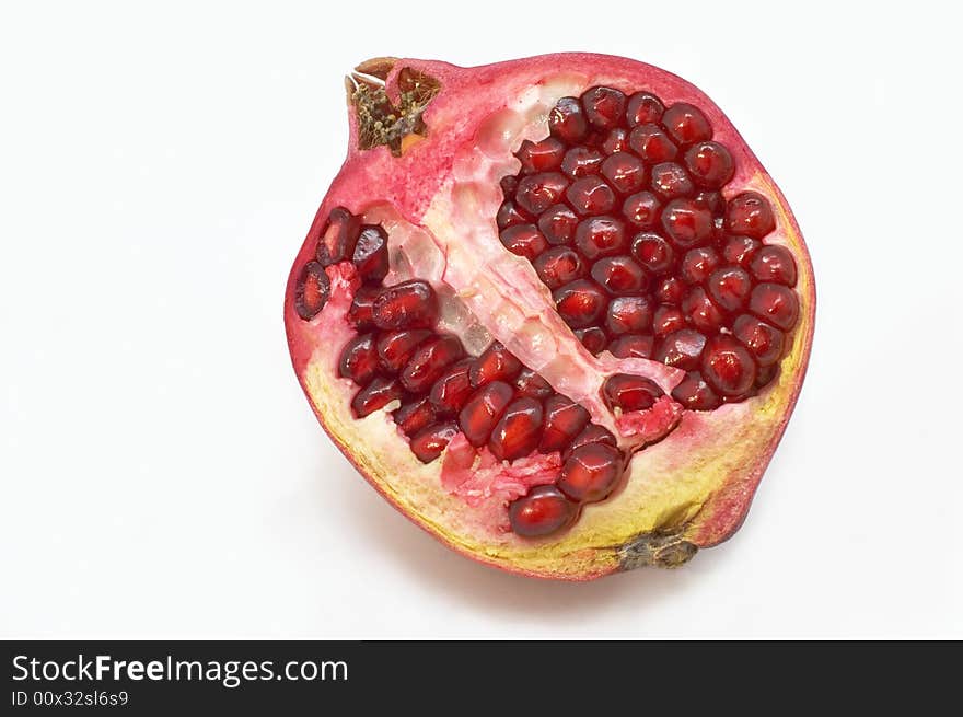 Pomegranate on a white background. Pomegranate on a white background.