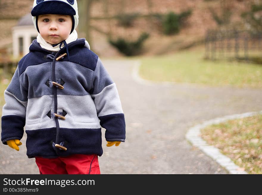 A little boy in the park.