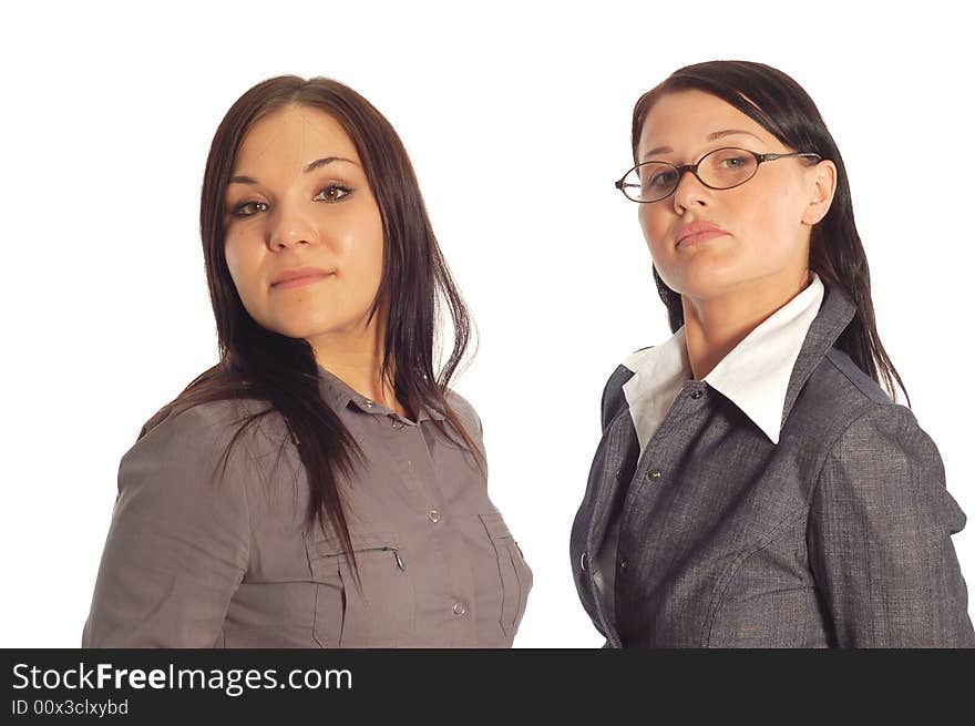 Two attractive businesswomen on white background. Two attractive businesswomen on white background