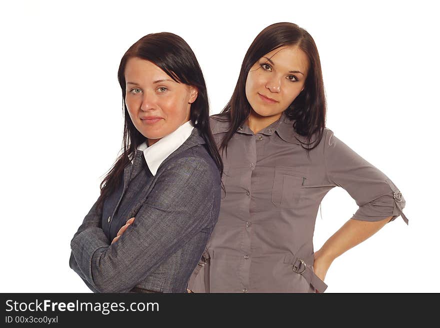 Two attractive businesswomen on white background. Two attractive businesswomen on white background