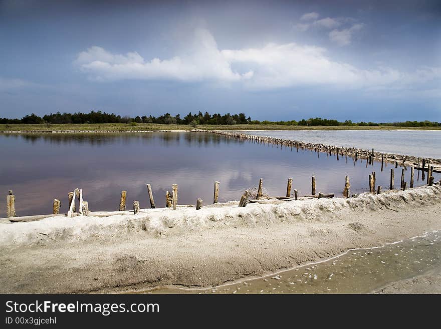 The Dams on hydrocloric lake.Summer solar day. The Dams on hydrocloric lake.Summer solar day