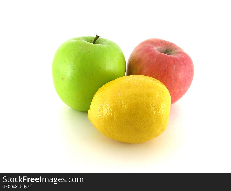 Green, red apple and yellow lemon on white background. Green, red apple and yellow lemon on white background.