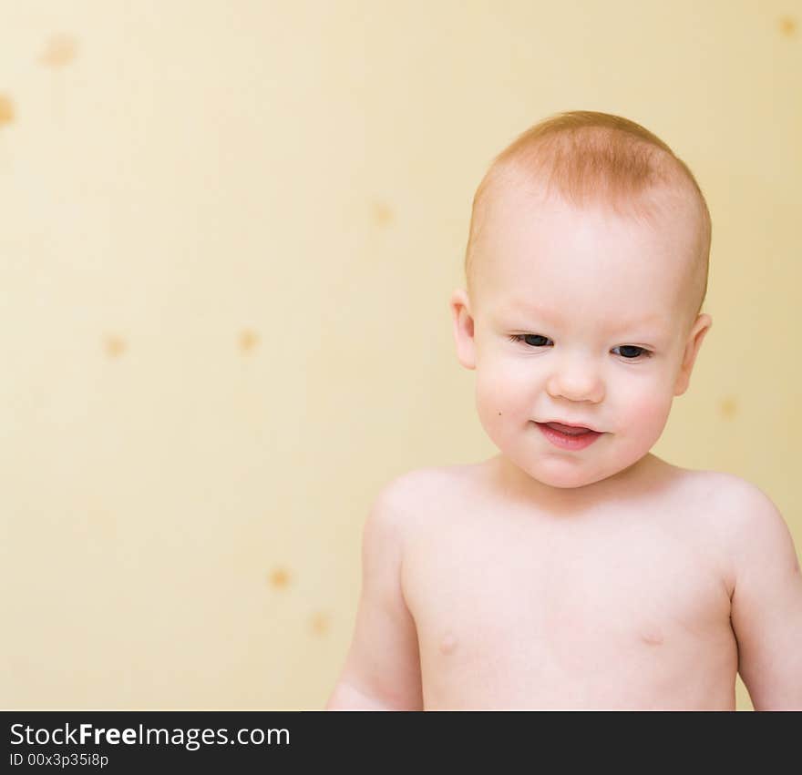 Enjoying baby stand on bed