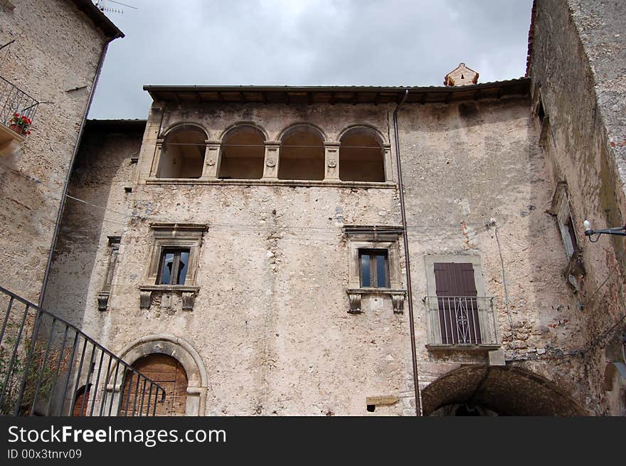 An old palace with a strip of blu sky, we cal feel the people who lives there long time ago.