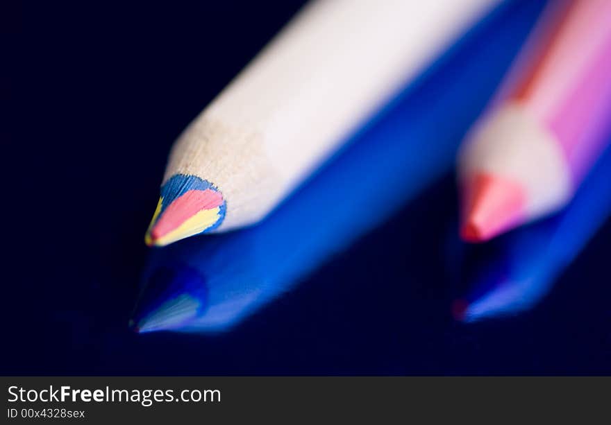 Color Pencil isolated on a blue background. Color Pencil isolated on a blue background