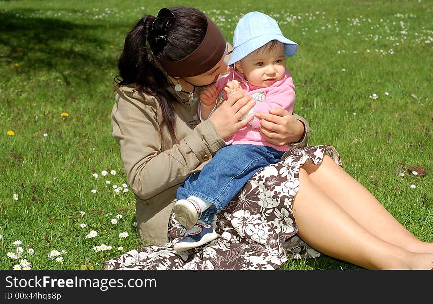 Happy family on green grass. Happy family on green grass