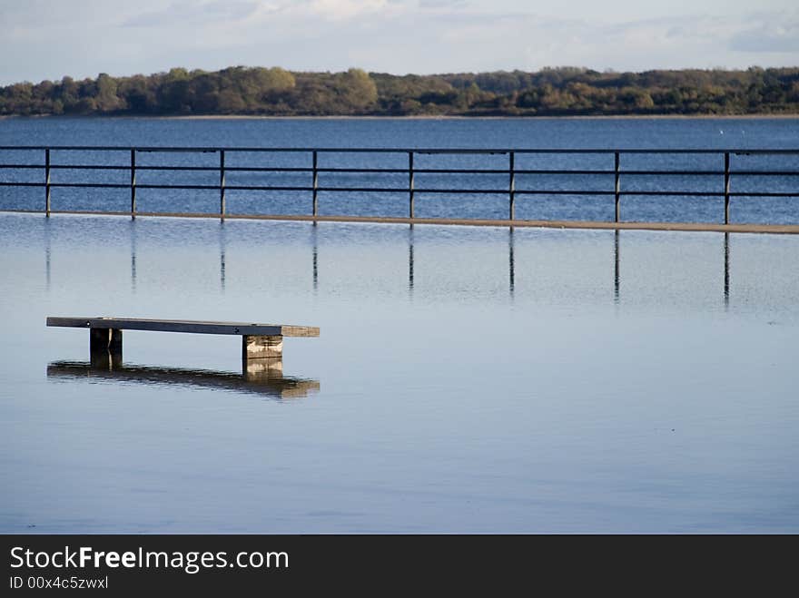 Bench and railing in the flood