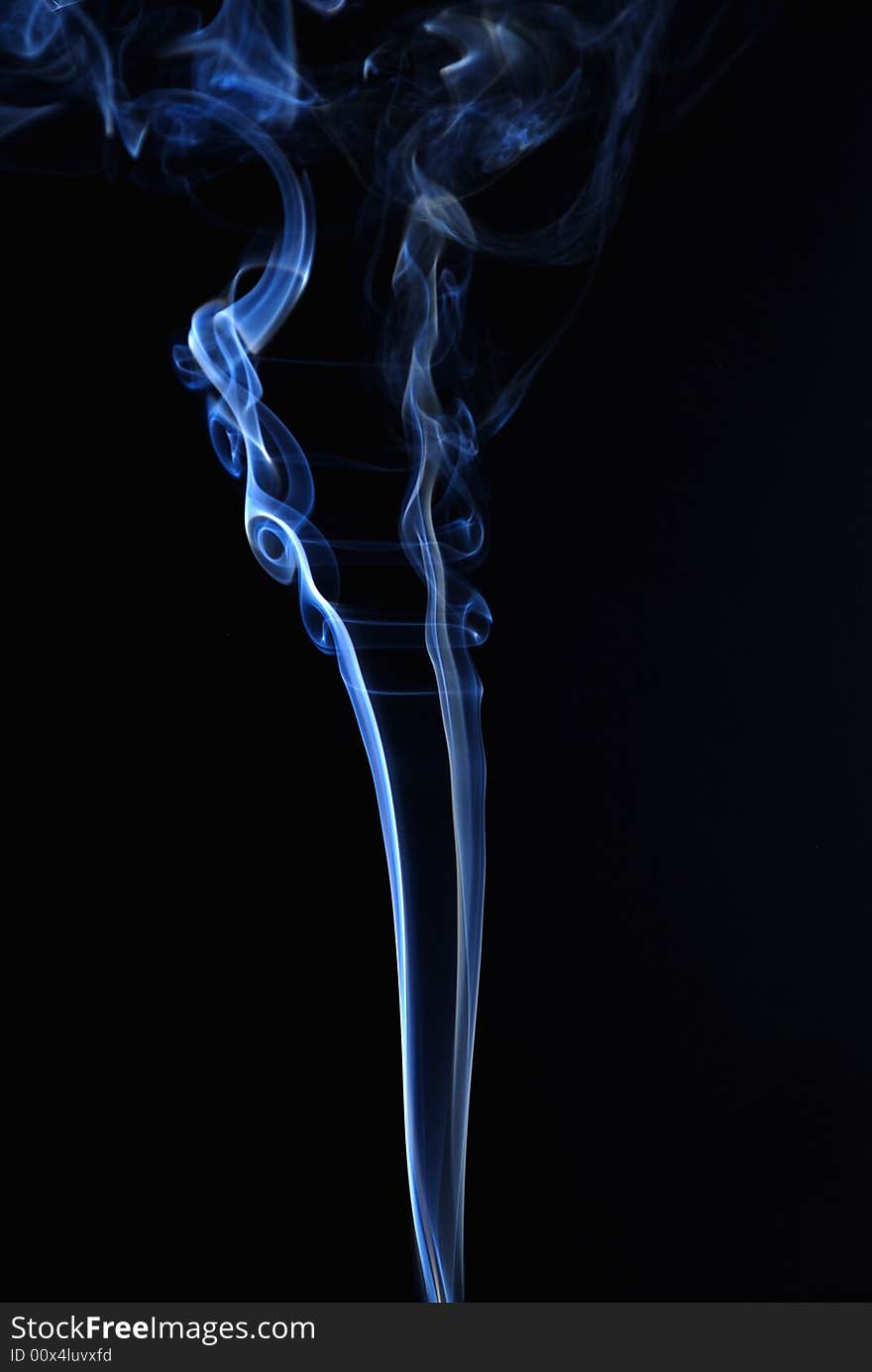 Blue smoke texture at black background